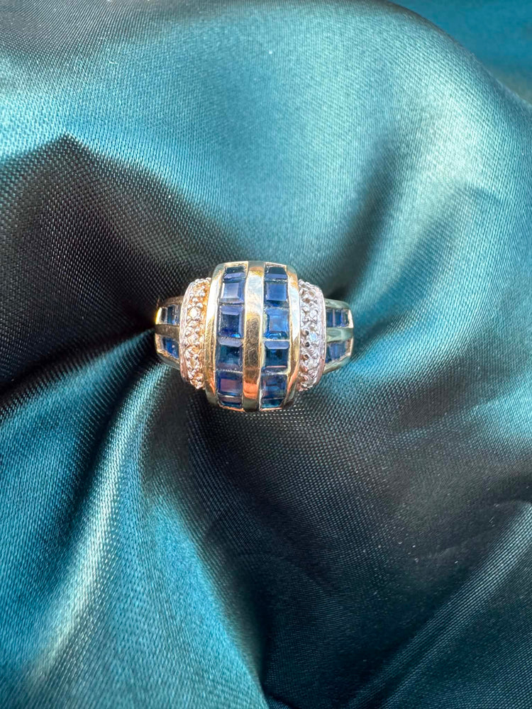 Sapphire and diamond dress ring in 9ct yellow gold, front view showing sapphires and diamonds