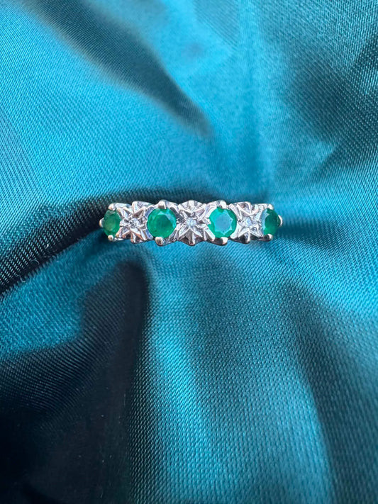 Diamond and emerald ring in 9ct gold, top view