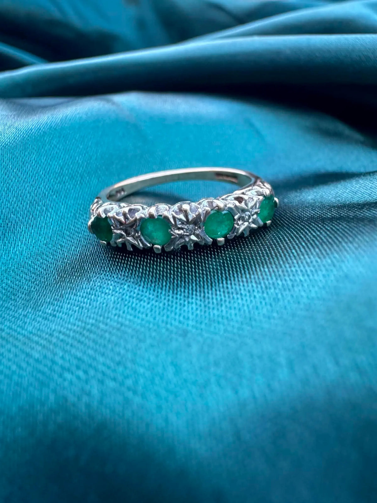 Diamond and emerald ring in 9ct gold, front view