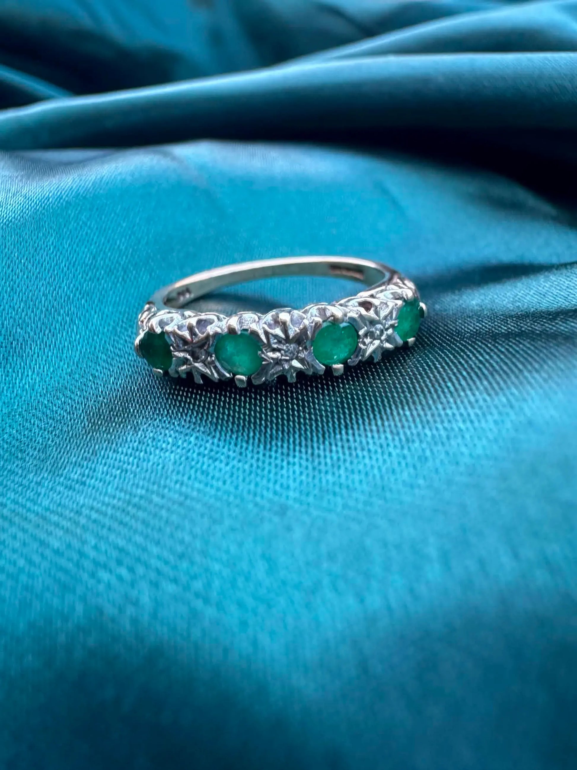 Diamond and emerald ring in 9ct gold, front view