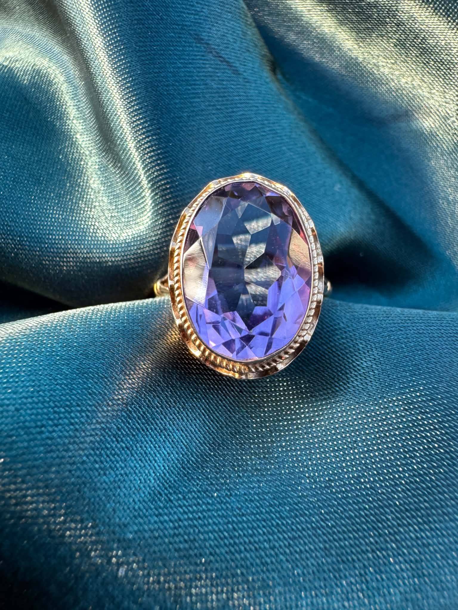1968 Amethyst Solitaire Ring in 9ct Gold — top view showing oval amethyst and decorative setting