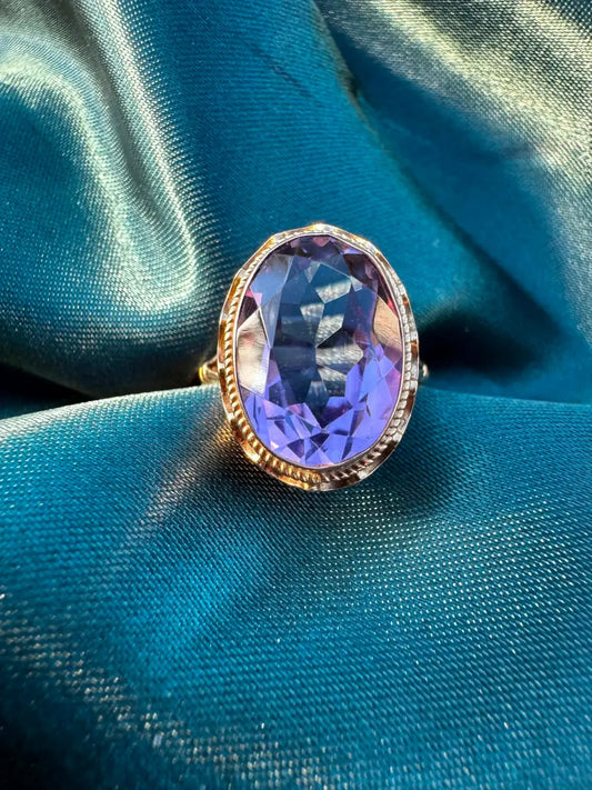 1968 Amethyst Solitaire Ring in 9ct Gold — top view showing oval amethyst and decorative setting