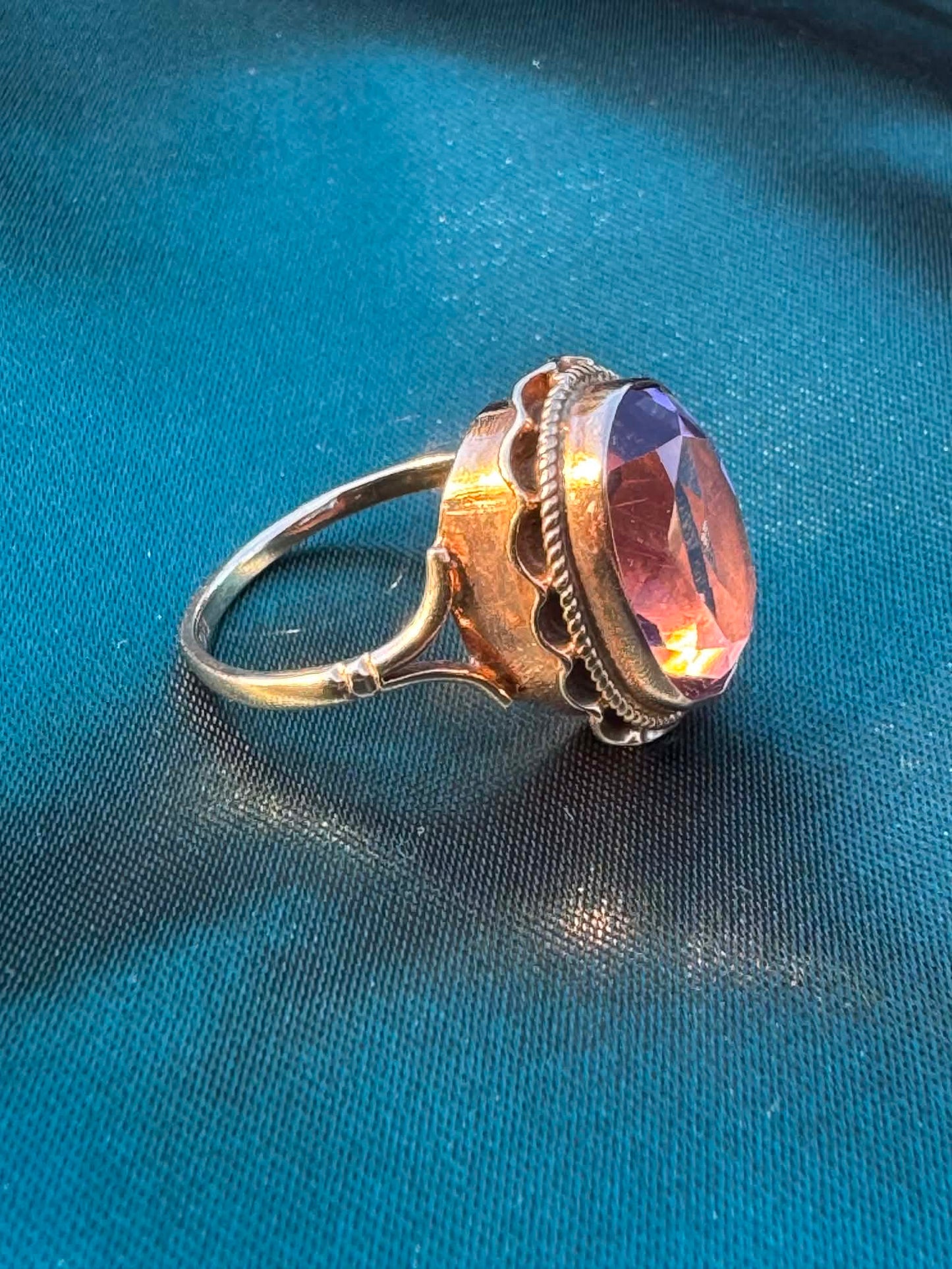 1968 Amethyst Solitaire Ring in 9ct Gold — side view showing oval amethyst and decorative gold setting