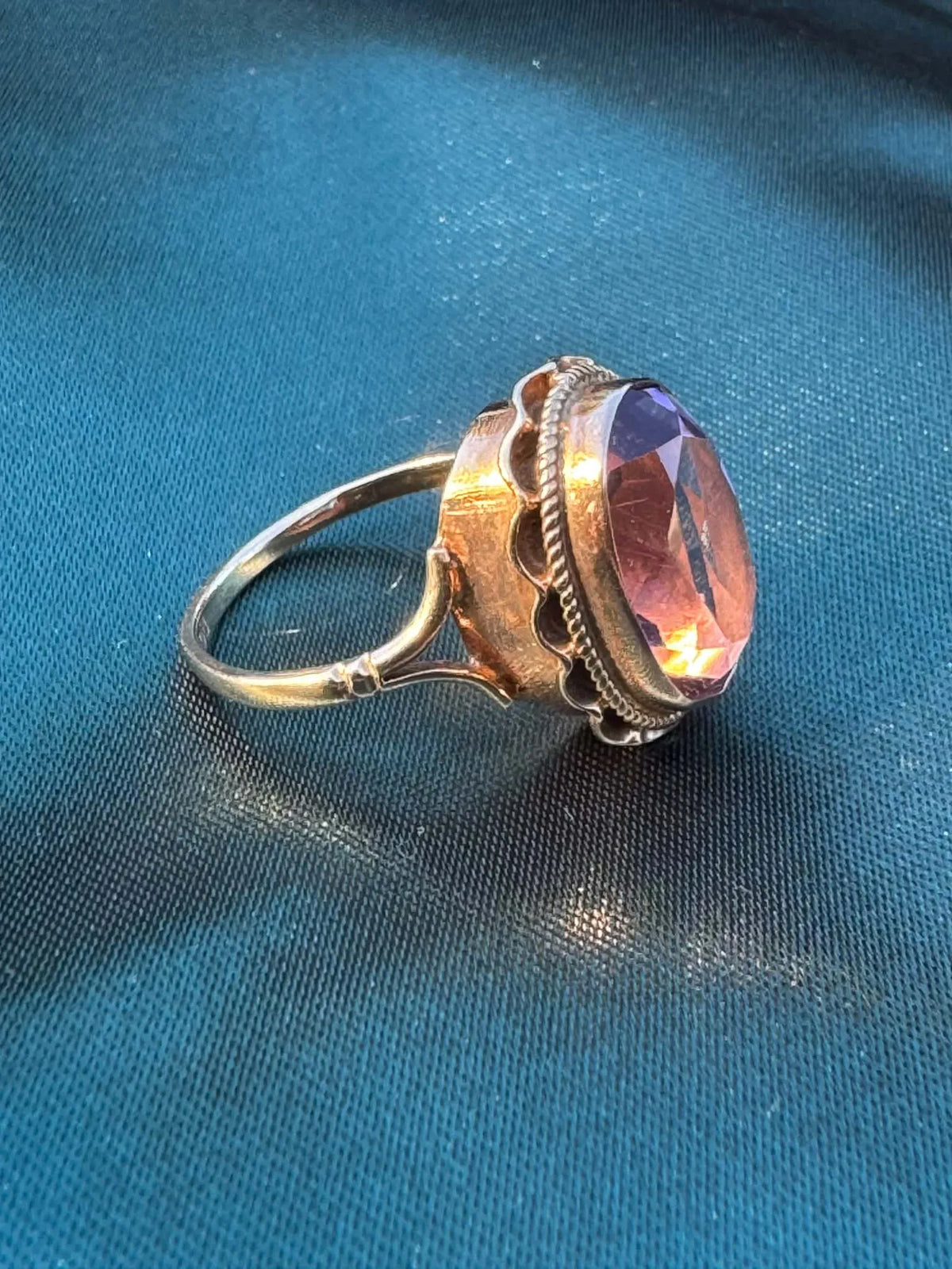 1968 Amethyst Solitaire Ring in 9ct Gold — side view showing oval amethyst and decorative gold setting