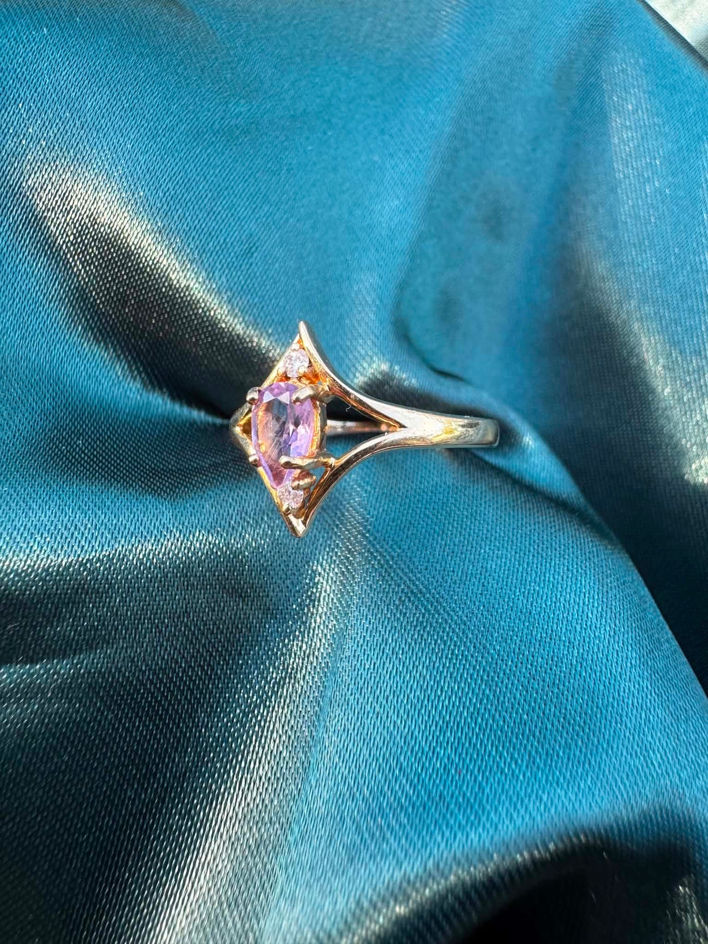 Amethyst and diamond star ring in 9ct gold, angled top view