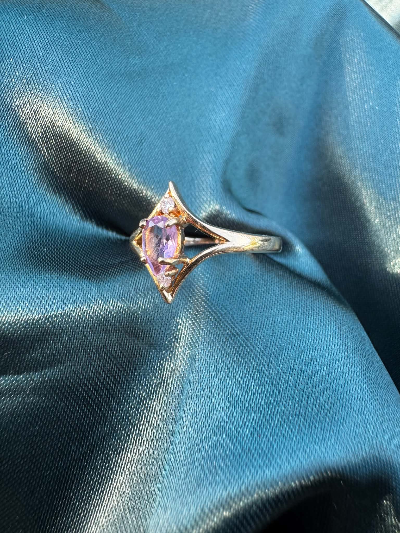 Amethyst and diamond star ring in 9ct gold, angled top view