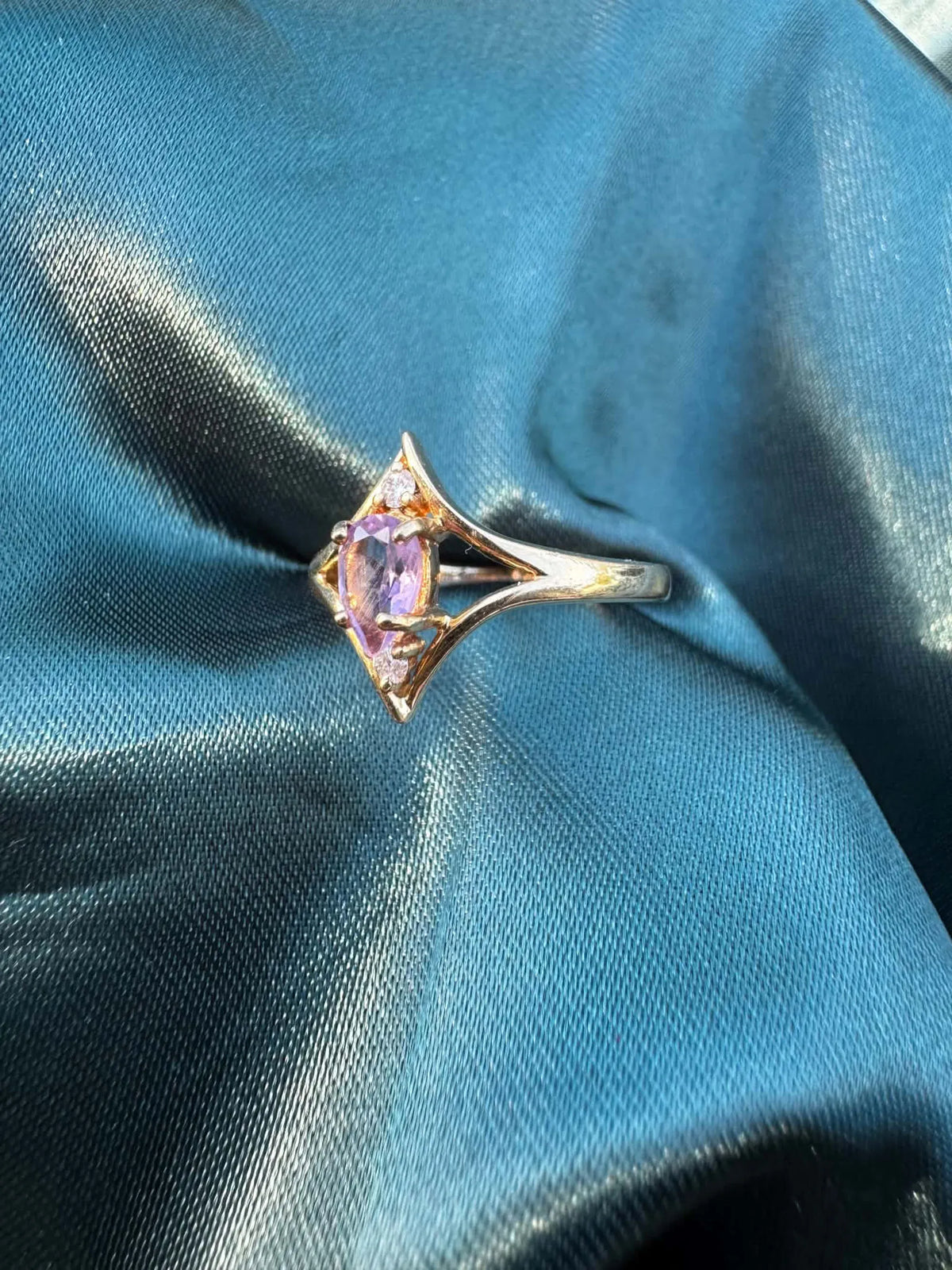 Amethyst and diamond star ring in 9ct gold, angled top view