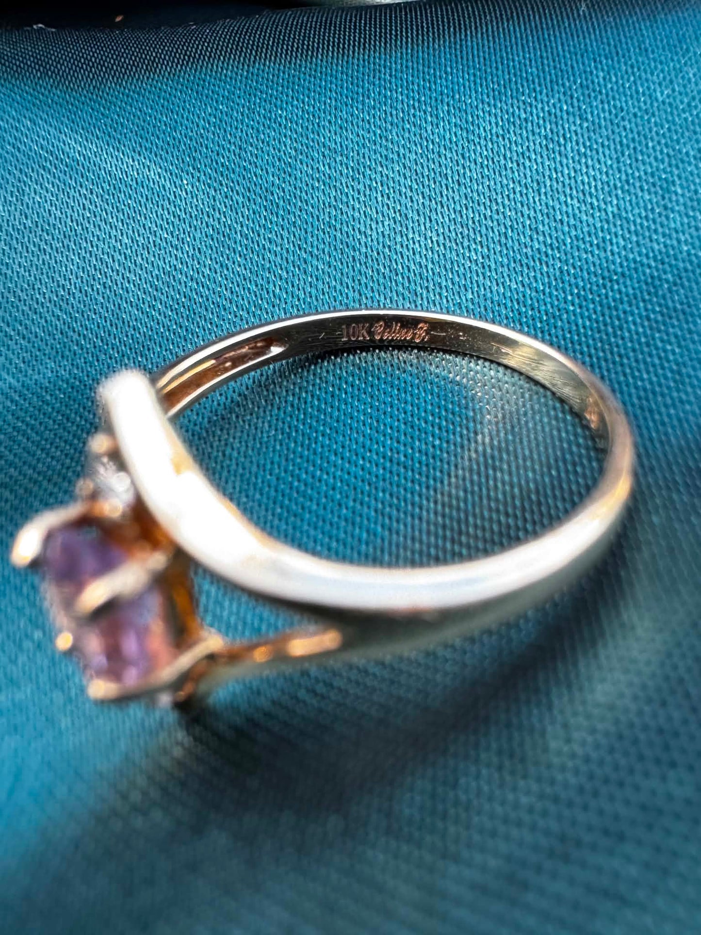 Amethyst and diamond star ring in 9ct gold, side top view