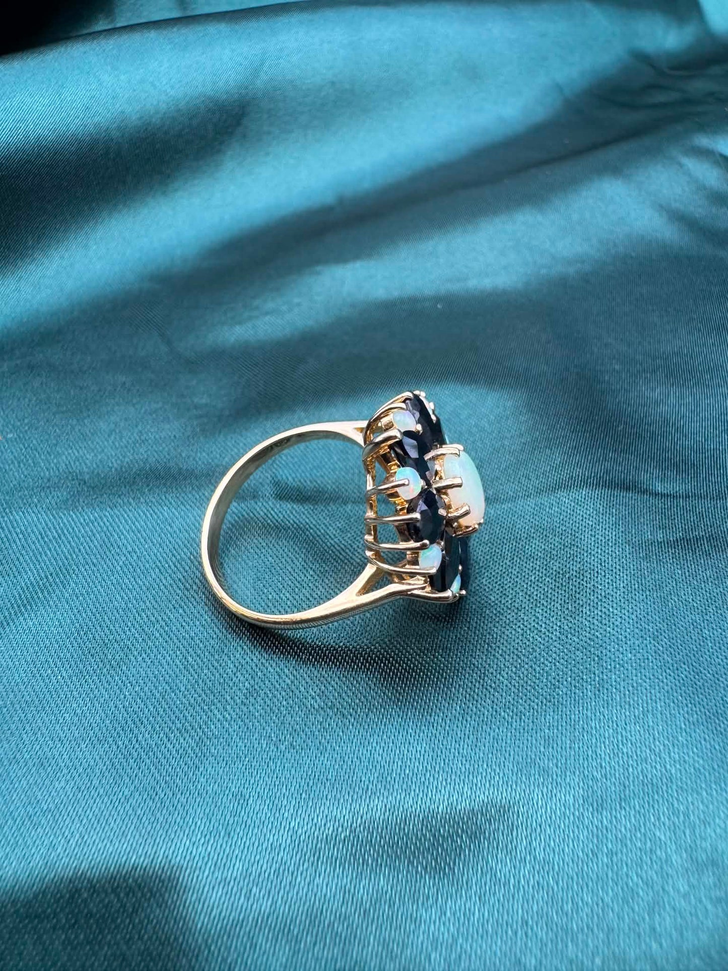 Opal and sapphire cluster ring in 9ct gold, side profile