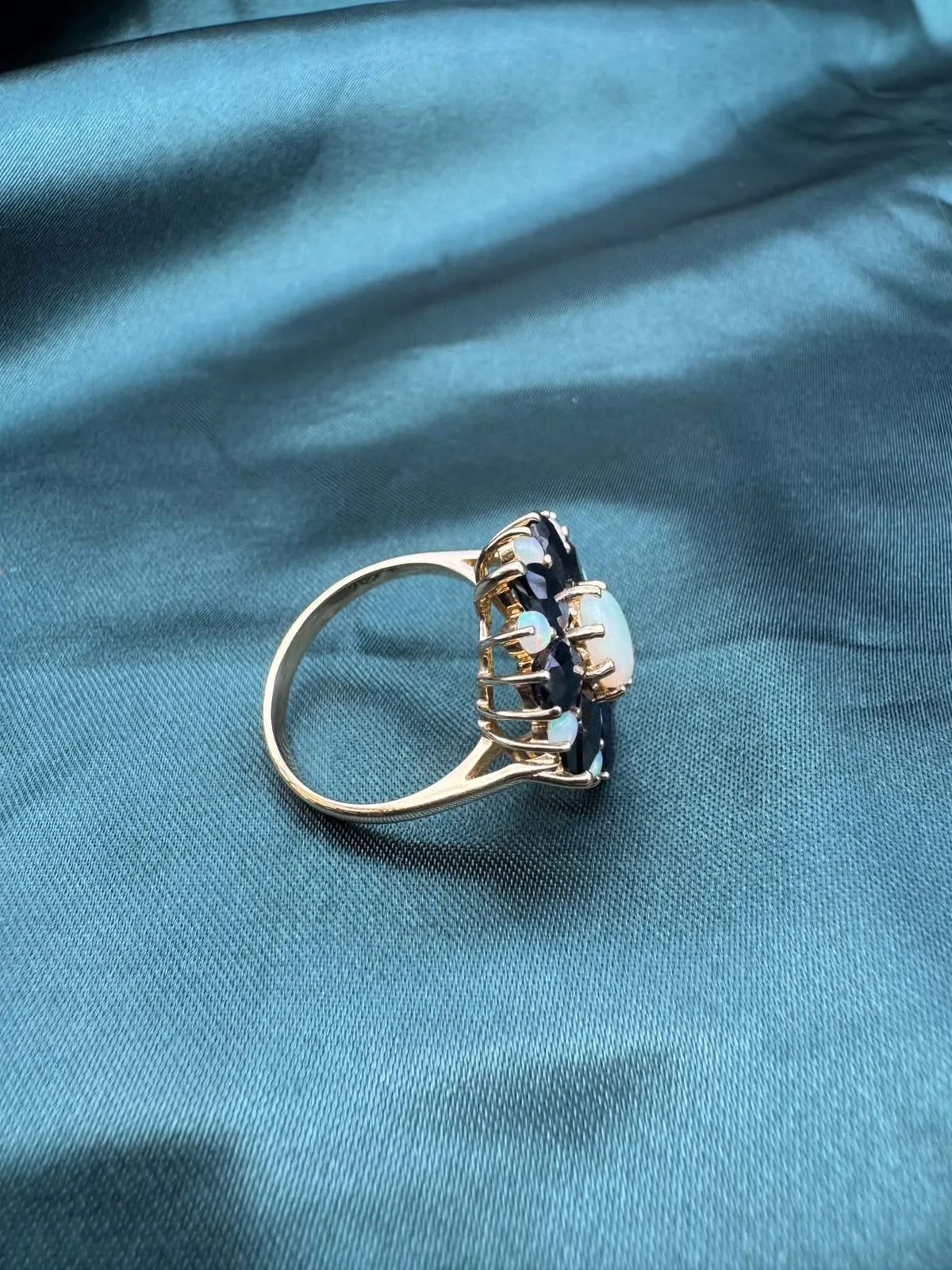 Opal and sapphire cluster ring in 9ct gold, side profile