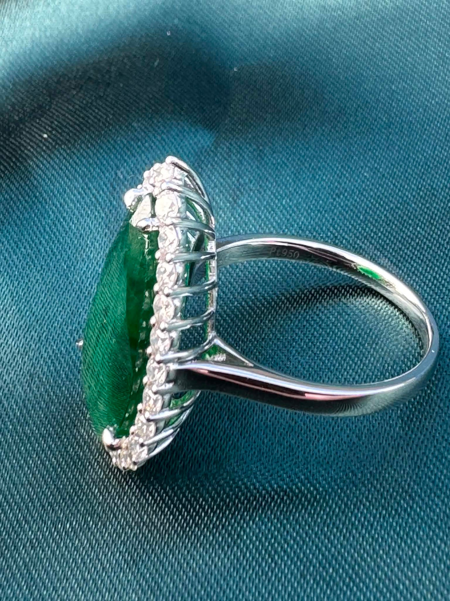 8.28ct pear emerald and diamond halo ring in platinum, side profile