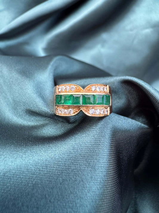 Emerald and diamond dress ring in 18ct yellow gold, front view showing square-cut emeralds and diamonds