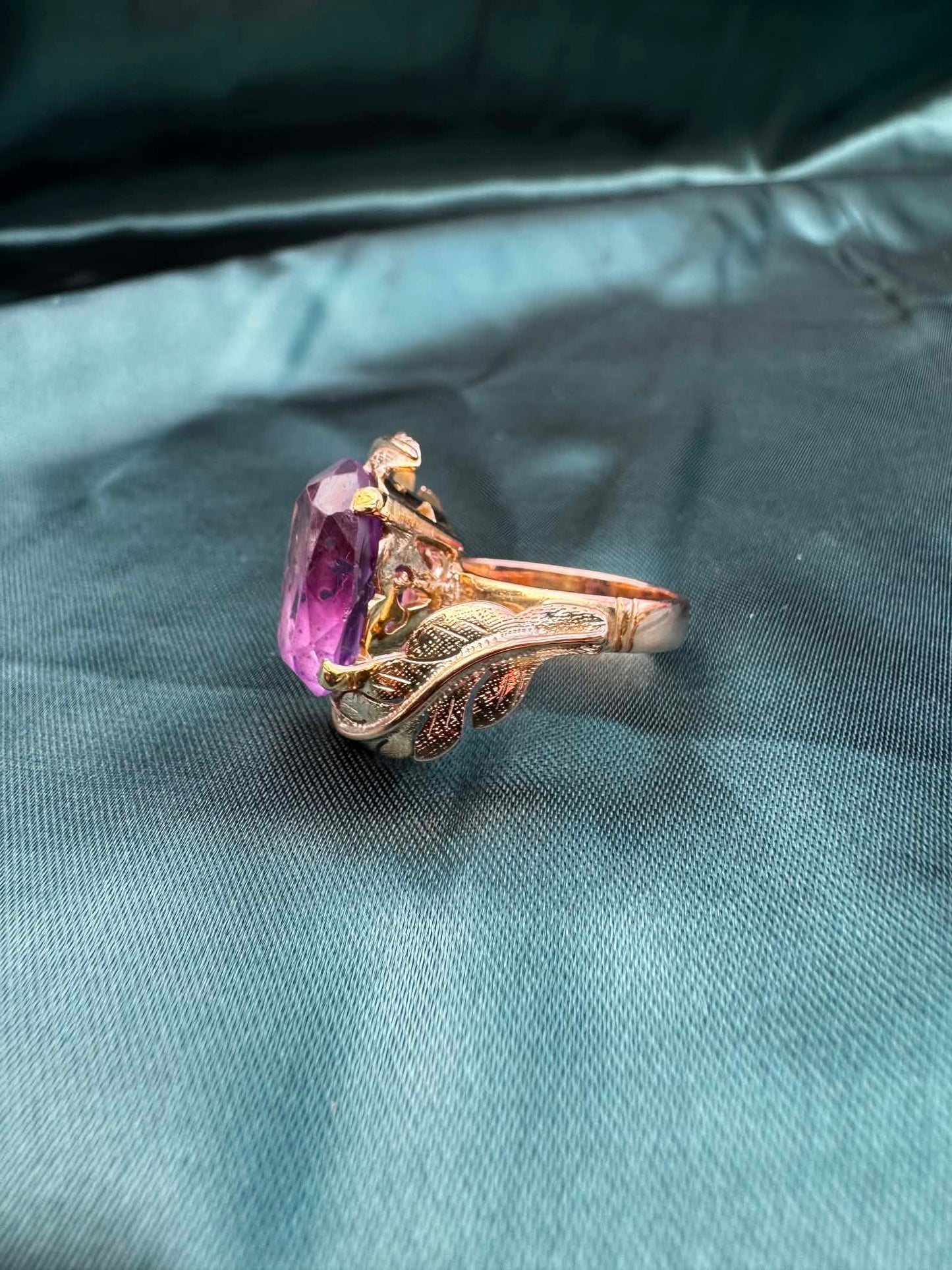 Amethyst foliate crossover cocktail ring in 14ct yellow gold, side profile view