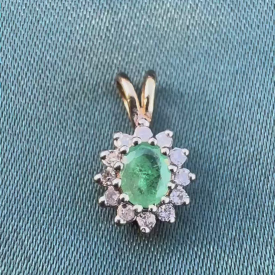 Emerald and diamond halo pendant in two-tone 9ct gold