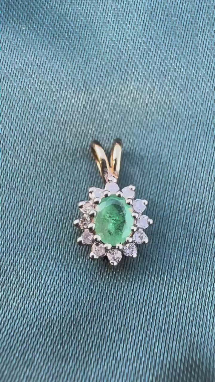 Emerald and diamond halo pendant in two-tone 9ct gold