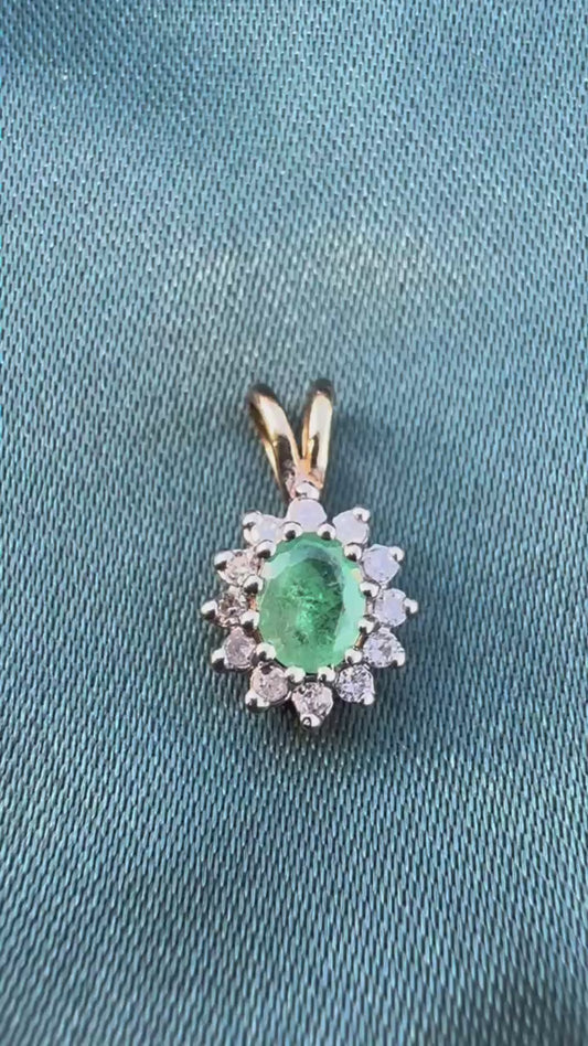Emerald and diamond halo pendant in two-tone 9ct gold