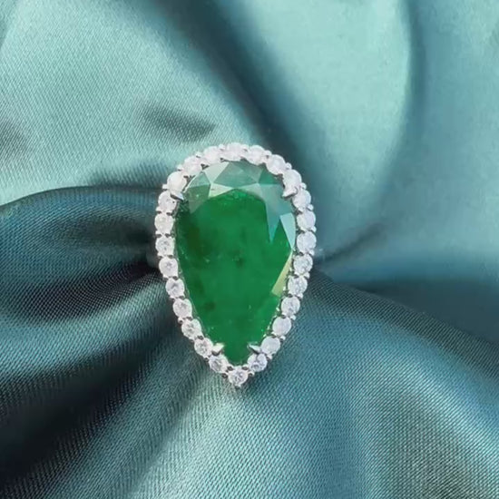 8.28ct pear emerald and diamond halo ring in platinum video