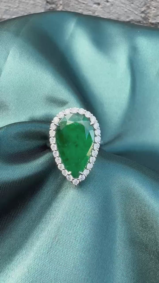 8.28ct pear emerald and diamond halo ring in platinum video